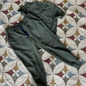 Figs Technical Collection scrubs set in moss. Olive green, top is XS bottom is S